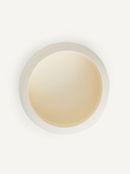 Load image into Gallery viewer, Round beige object on a white background