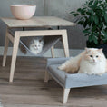 Load image into Gallery viewer, The Kikko is a multifunctional table, combining a coffee table with a comfortable hammock for your cats.