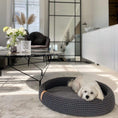 Load image into Gallery viewer, Dog bed made of high-quality braided cotton string with great detail attention. The oval shape fits perfectly with the dog's natural shape when resting. The cushion on the bottom is fully removable, which helps to keep the dog bed clean and functional. Lukko is perfect for short naps and longer rest. Dedicated to dogs who value comfort.
