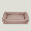 Load image into Gallery viewer, The Stokke Dog Bed is designed with precision and style, reflecting the latest trends in color matching. The base cushions are covered in high-quality cotton and filled with elastic foam, providing comfort and support for your dog's body. With a soft yet firm design, the bed supports the spine and joints while offering a peaceful sleep. The delicate bed cover is made with a durable and easy-to-clean fabric, ensuring both comfort and practicality.