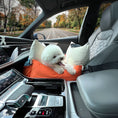 Cargar la imagen en la vista de la galería, white small dog breed sitting inside an orange car seat for pets