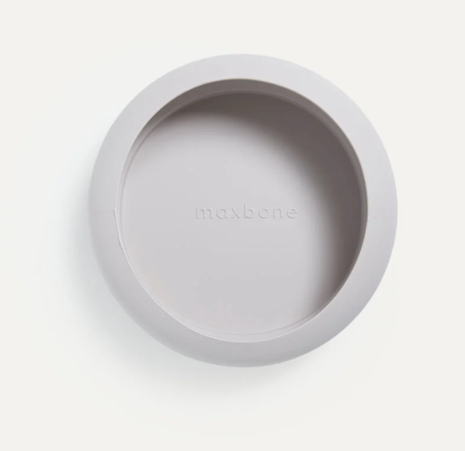 Gray pet bowl with 'maxbone' branding on a white background