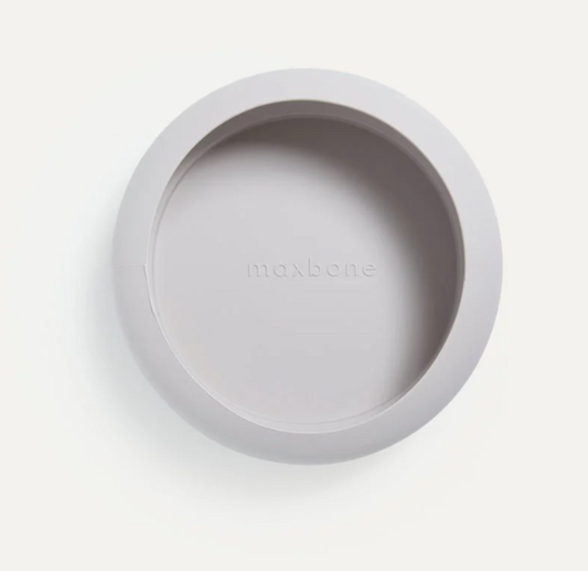 Gray pet bowl with 'maxbone' branding on a white background