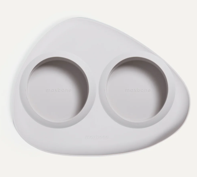 Grey pet bowl and mat silicone set on a white background