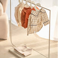 Load image into Gallery viewer, This clothing rack is both aesthetically pleasing and practical with the added bonus of a bottom shelf to store wet tissue and already-folded clothing.
