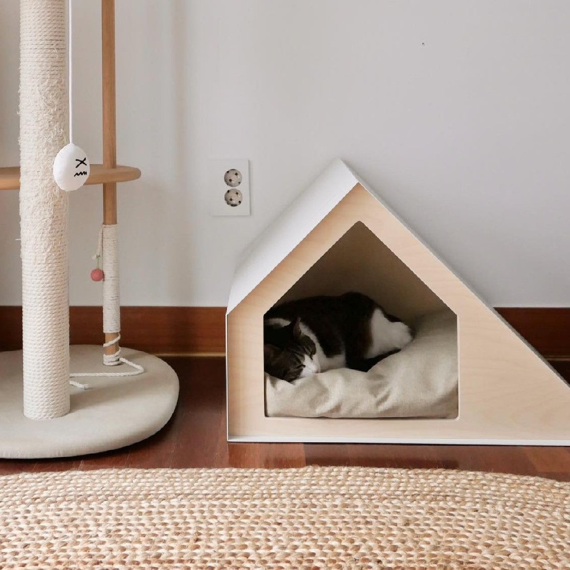 Elegant pet house crafted from plywood in a light tone and designed with steel, combining modern minimalism with comfort for dog and cats.