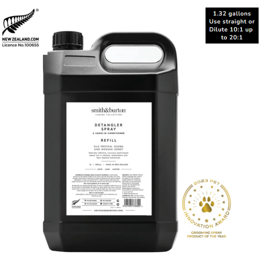 Black bottle of Smith & Burton Detangler Spray Refill with label and branding on a white background