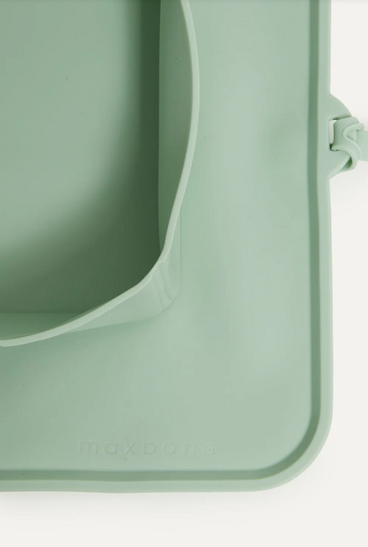 Mint green silicone on the go (travel) pet bowls on a white background