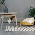 Load image into Gallery viewer, The Kikko is a multifunctional table, combining a coffee table with a comfortable hammock for your cats.
