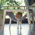 Load image into Gallery viewer, The Kikko is a multifunctional table, combining a coffee table with a comfortable hammock for your cats.
