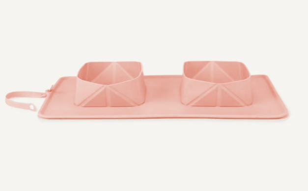 Pink green silicone on the go (travel) pet bowls on a white background