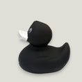 Load image into Gallery viewer, Elevate bath time to a playful experience with our exclusive rubber duckie, affectionately named Chewie. Use during your puppy's bath time to keep them entertained and engaged, creating a positive and enjoyable experience during their bath time.
