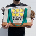 Cargar la imagen en la vista de la galería, Smiley Dog Carrier. Crafted from 100% cotton canvas and designed with comfort, safety and convenience in mind, this chic carrier allows you to enjoy easy, stress-free outings with your pet.
