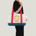 Cargar la imagen en la vista de la galería, Smiley Dog Carrier. Crafted from 100% cotton canvas and designed with comfort, safety and convenience in mind, this chic carrier allows you to enjoy easy, stress-free outings with your pet.
