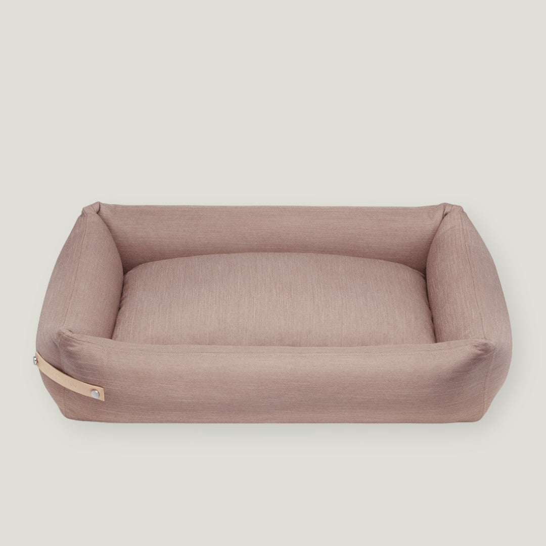 The Stokke Dog Bed is designed with precision and style, reflecting the latest trends in color matching. The base cushions are covered in high-quality cotton and filled with elastic foam, providing comfort and support for your dog's body. With a soft yet firm design, the bed supports the spine and joints while offering a peaceful sleep. The delicate bed cover is made with a durable and easy-to-clean fabric, ensuring both comfort and practicality.