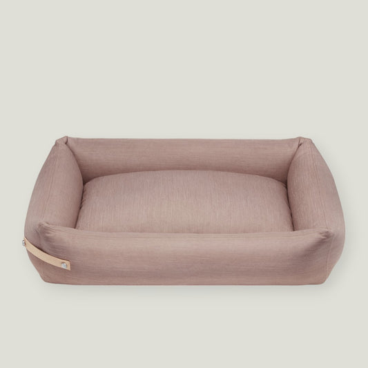 The Stokke Dog Bed is designed with precision and style, reflecting the latest trends in color matching. The base cushions are covered in high-quality cotton and filled with elastic foam, providing comfort and support for your dog's body. With a soft yet firm design, the bed supports the spine and joints while offering a peaceful sleep. The delicate bed cover is made with a durable and easy-to-clean fabric, ensuring both comfort and practicality.