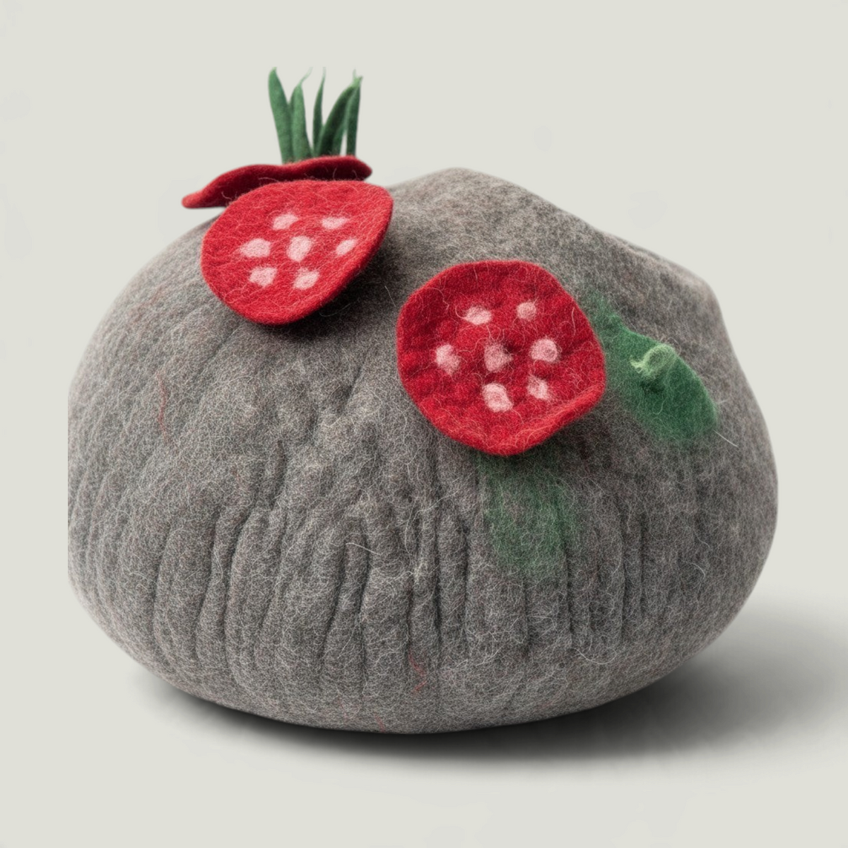 Nala's Pet Furniture Boutique handcrafted grey felted wool cat cave with decorative red strawberry and green leaf accents